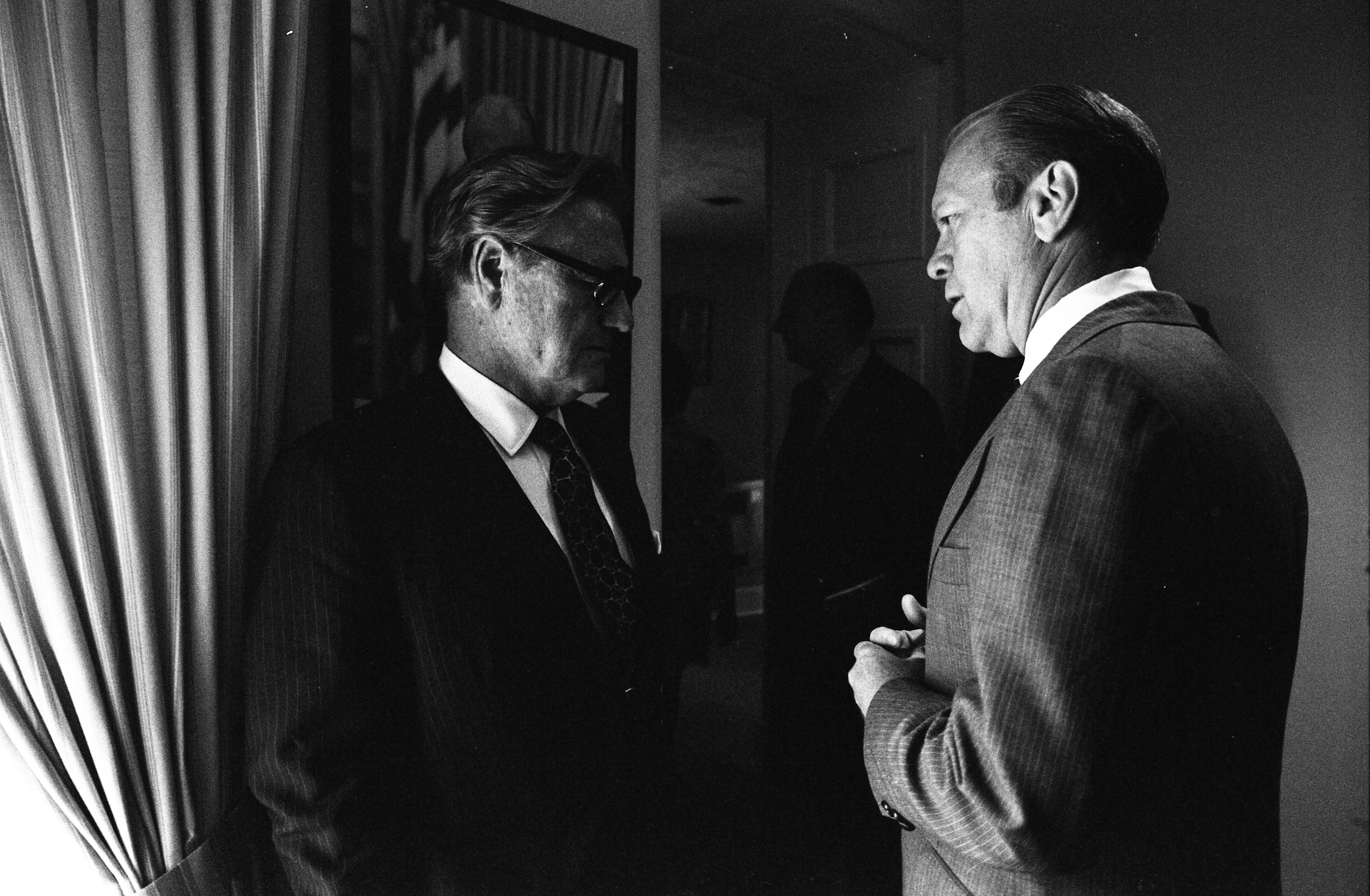 President Ford and Nelson A. Rockefeller talk outside the White House press briefing area after the President announced his intention to nominate Rockefeller as Vice President of the United States. August 20,1974 