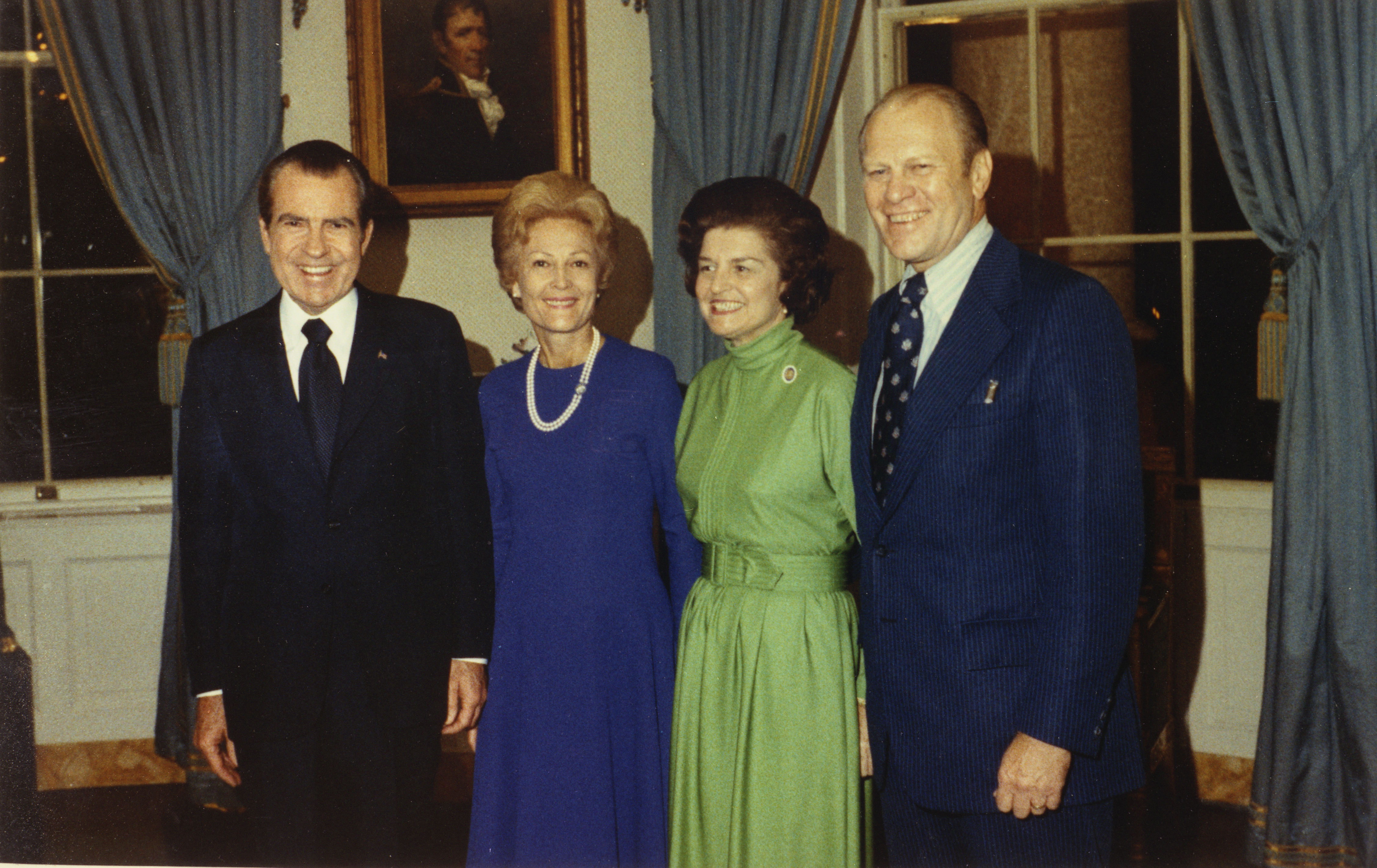 President Richard M. Nixon, First Lady Pat Nixon, Betty Ford, and Representative Gerald R. Ford in the Blue Room following the nomination of Gerald Ford as Vice President, 10/12/1973.