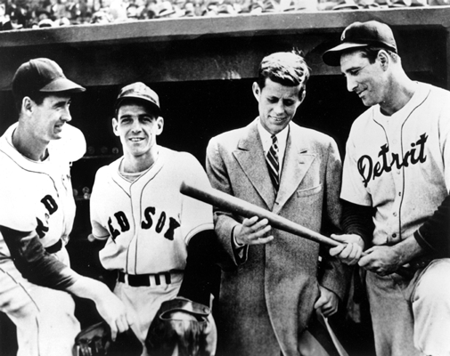 John F. Kennedy chats with Ted Williams, Eddie Pellagrini, and Hank Greenberg during a 1946 Tiger road trip to Fenway Park in Boston, April 1946.  