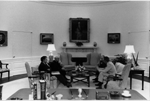 A4253-11 President Ford meets in the Oval Office with Msgr. Herman H. Zerfas, Superintendent of Education, Diocese of Grand Rapids, and Administrator Ivan E. Zylstra. James M. Cannon, Assistant to the President for Domestic Affairs, is also present. April 28, 1975.
