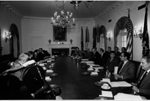 A4254-9. President Ford meets with his advisers for an Energy/Economic meeting in the Cabinet Room. April 28, 1975. (left to right: Federal Reserve Board Chairman Arthur Burns; Treasury Secretary William Simon; Vice President Nelson Rockefeller; OMB Director James T. Lynn; Domestic Council Director James Cannon; Domestic Council Deputy Director Richard Dunham; Deputy Assistant Dick Cheney; EPB Director Bill Seidman; Commerce Secretary Rogers C.B. Morton; President Gerald R. Ford; OMB Associate Director Frank Zarb; CEA Chairman Alan Greenspan; Counsellor John Marsh. Against the wall EPB Executive Secretary Roger Porter and three unidentified men.