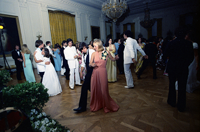 Susan Ford dancing with her date Billy Pifer at the Holton-Arms School Senior Prom, 5/31/1975