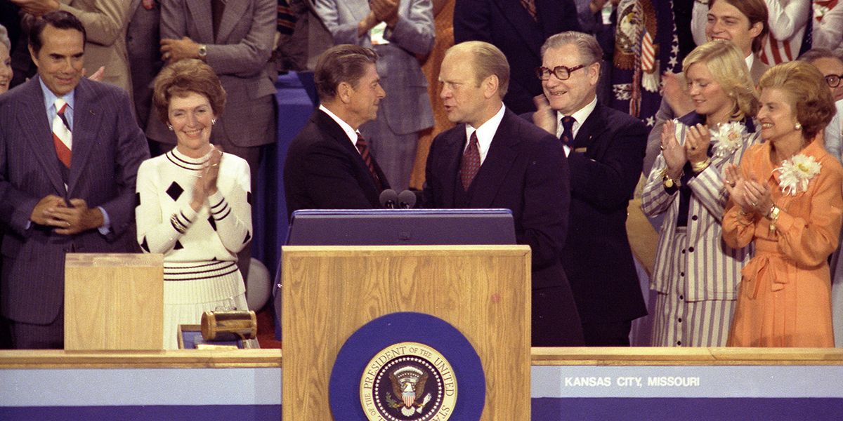 President Ford shaking hands with Ronald Reagan at the podium after his convention speech.