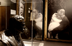 Installation view of Teddy Roosevelt: A Singular Life. Left, bronze study for Mt. Rushmore. Loan Courtesy of the Sagamore Hill National Historic Site, National Park Service, U.S. Department of Interior.
