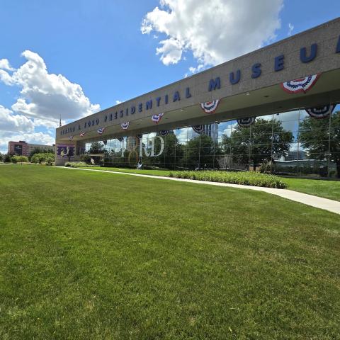 The expansive front lawn of the Museum is shown