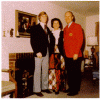 H0072-2. Mike Ford poses with his parents in front of the fireplace in the living room of the family residence at 514 Crown View Drive, Alexandria, VA. December 1972. H0072-2. Mike Ford poses with his parents in front of the fireplace in the living room of the family residence at 514 Crown View Drive, Alexandria, VA. December 1972.