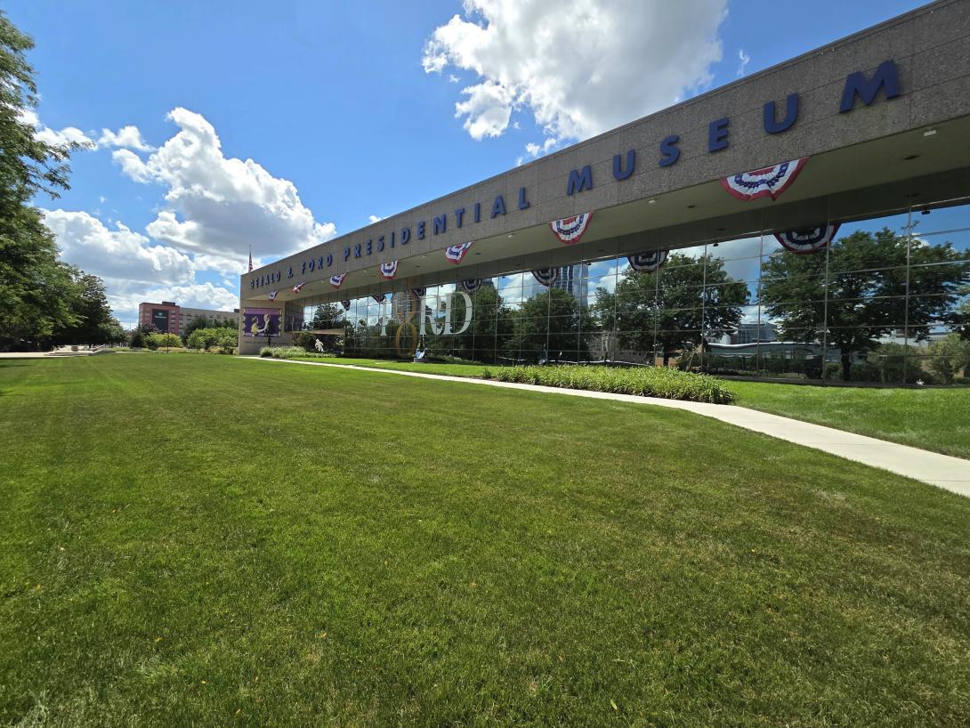 The expansive front lawn of the Museum is shown