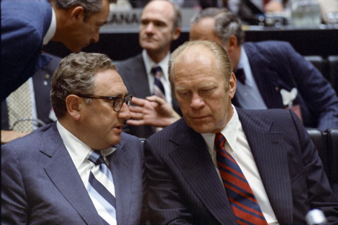  Gerald R. Ford and Henry A. Kissinger talk at the Opening of the Conference on Security and Cooperation in Europe