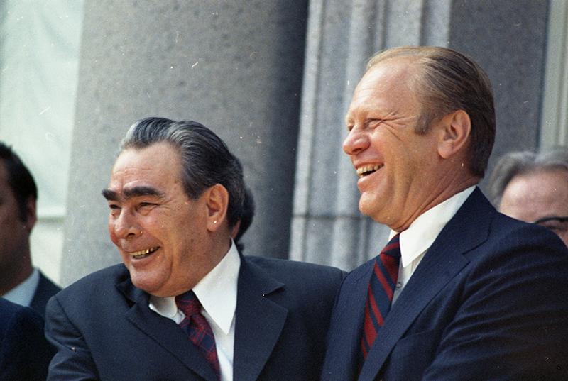 Brezhnev and Gerald R. Ford smile outside of the American Embassy Residence during the U.S.- Soviet Bilateral Meeting